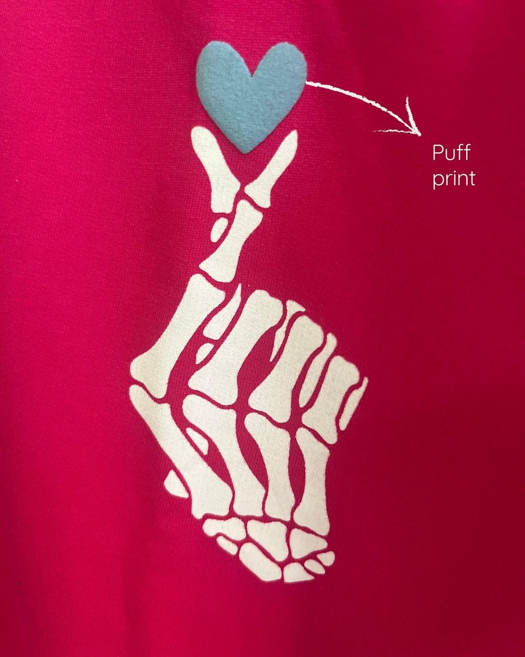 Fuschia pink oversized cotton t-shirt with 'Skeleton hands making korean love sign' design – Out of Office clothing